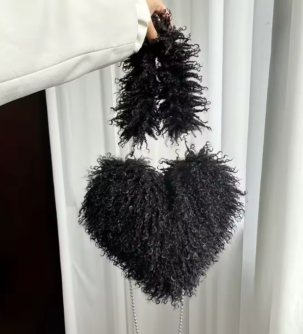Black heart plush crossbody bag with fuzzy texture and bead chain strap
