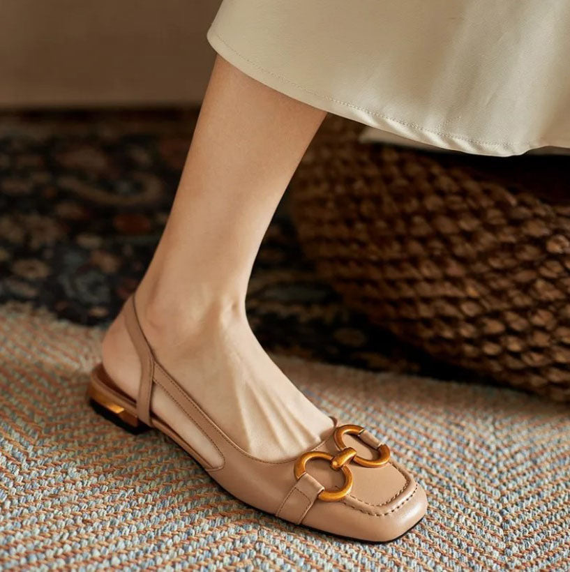Light beige orthopedic sandals with gold-tone link ornament and low block heel