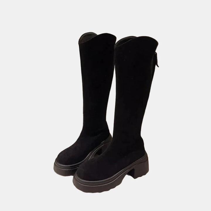 Black tall boots pair, suede-look upper, chunky sole and block heel, rounded toe