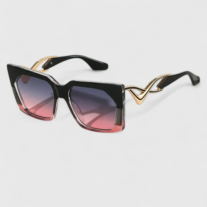 Cat-eye sunglasses with black frame and gradient lenses in purple and pink