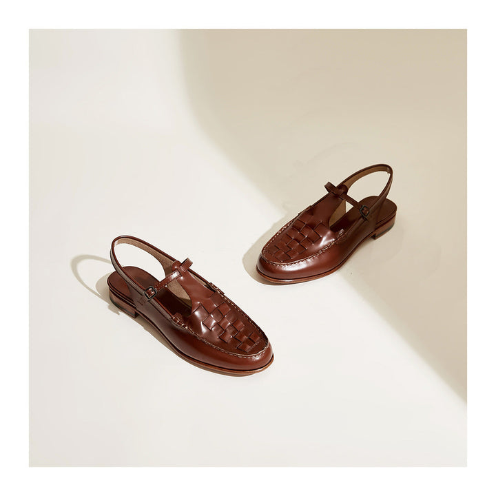 Brown woven charm sandals pair, T-strap buckle and woven vamp detail, low heel