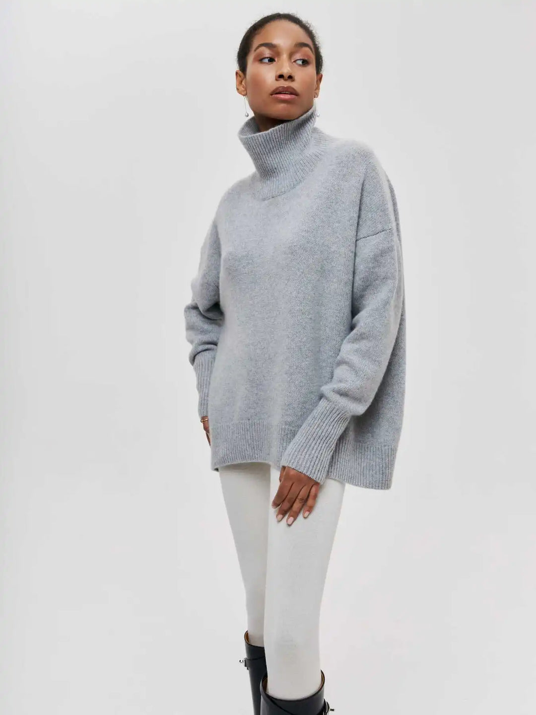 Gray turtleneck sweater, loose silhouette with ribbed cuffs and hem