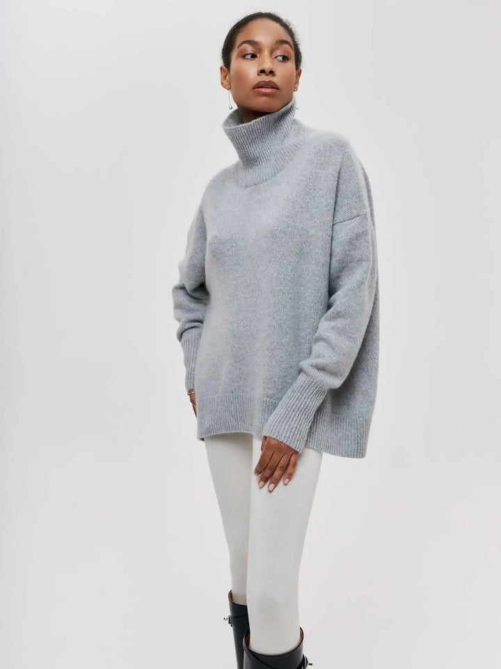 Gray turtleneck sweater, loose silhouette with ribbed cuffs and hem