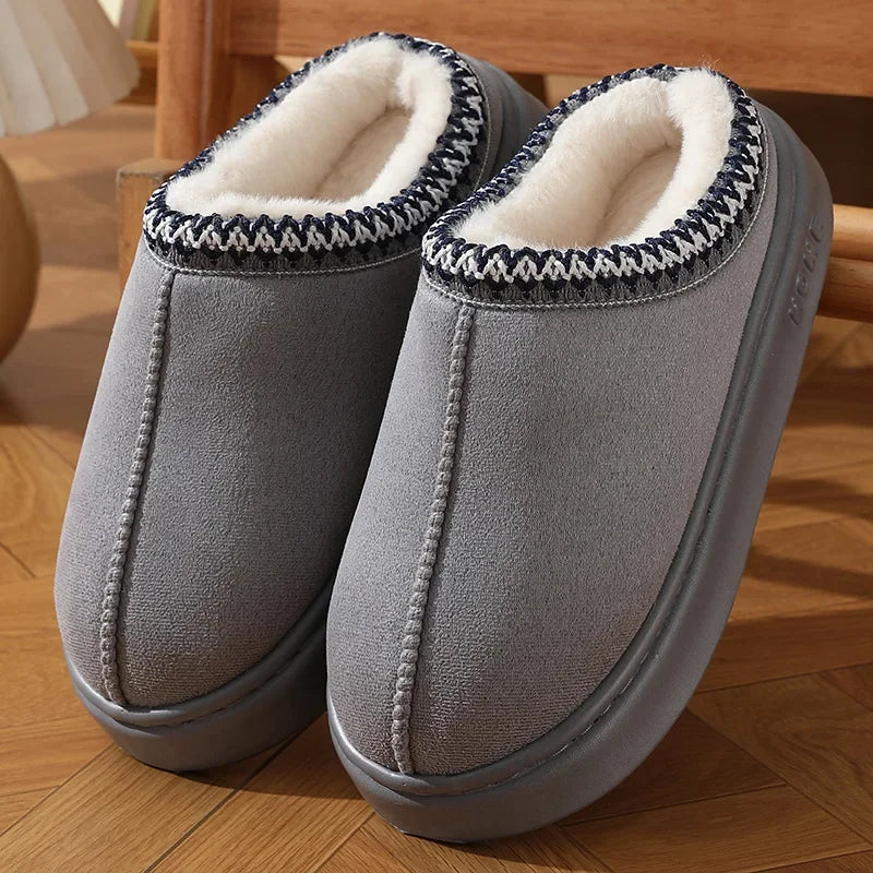Gray platform slippers with white faux-fur lining and textured braided trim