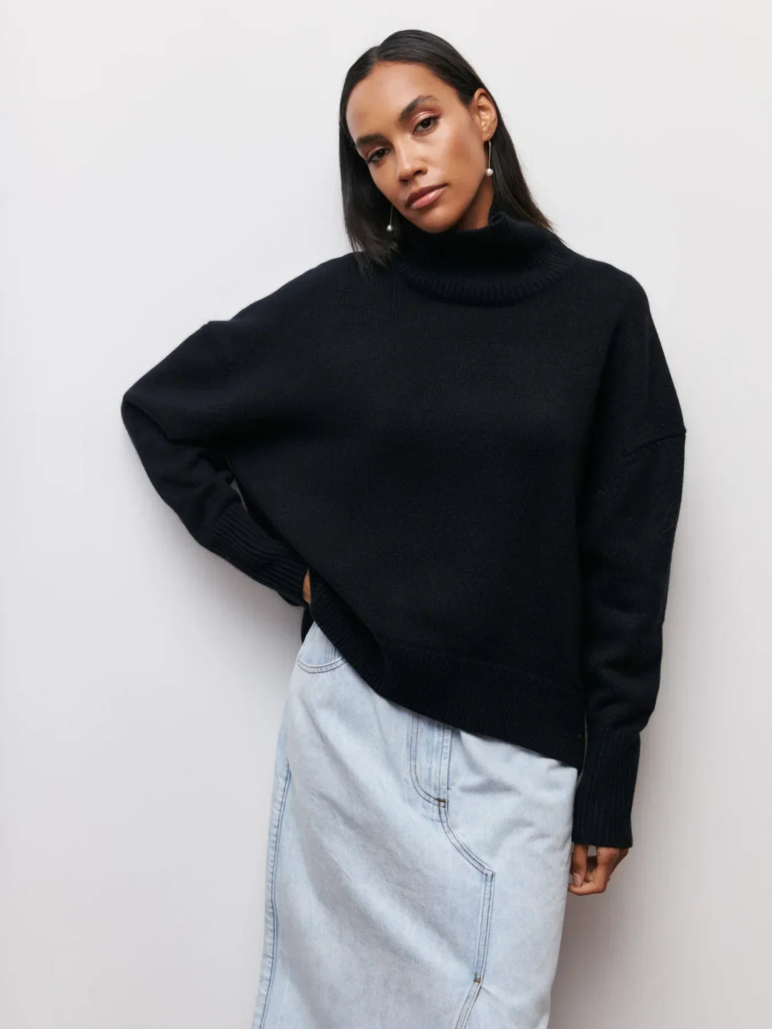 Black turtleneck sweater with ribbed hem and cuffs