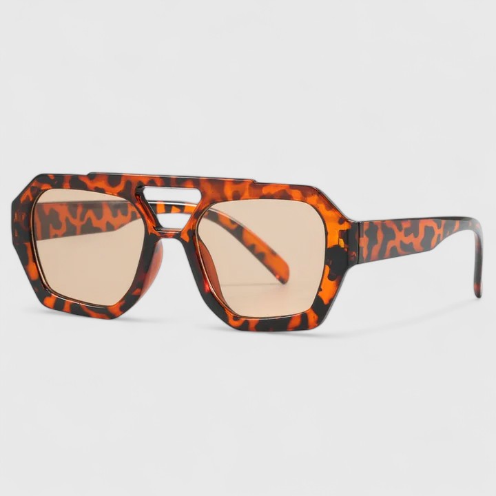 Sunglasses with orange leopard frames and light beige tinted lenses