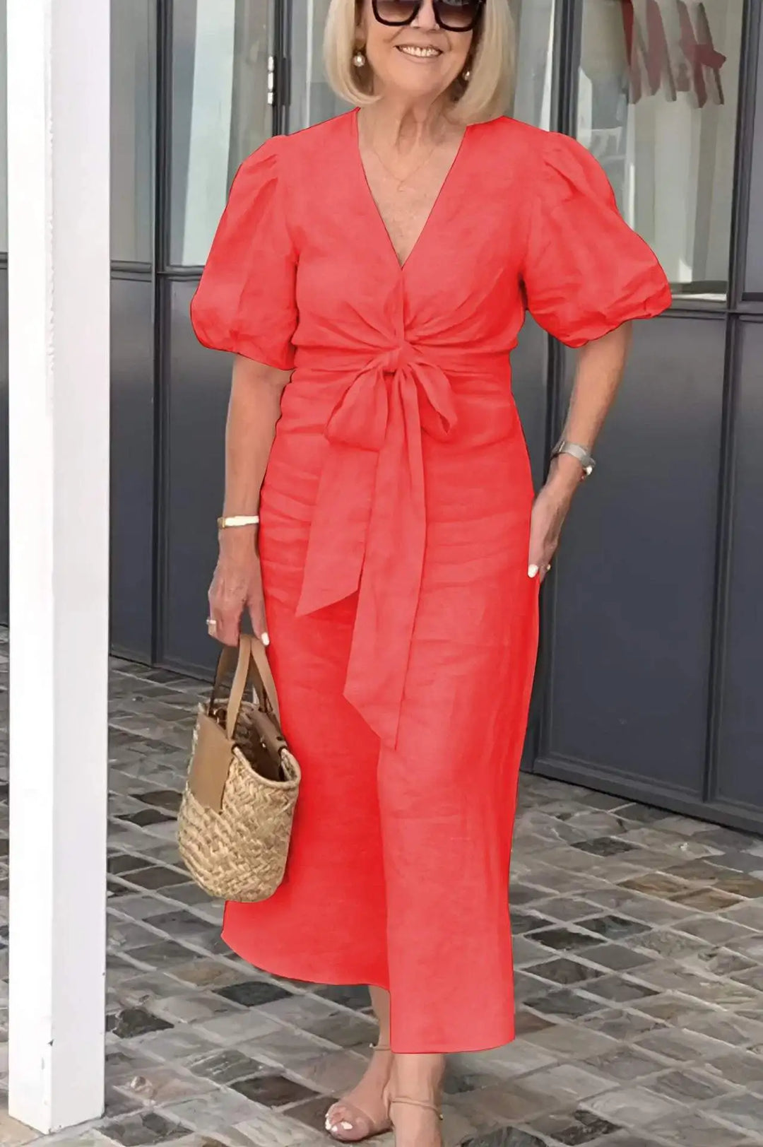 Red V-neck midi dress with puff sleeves and waist tie, front view