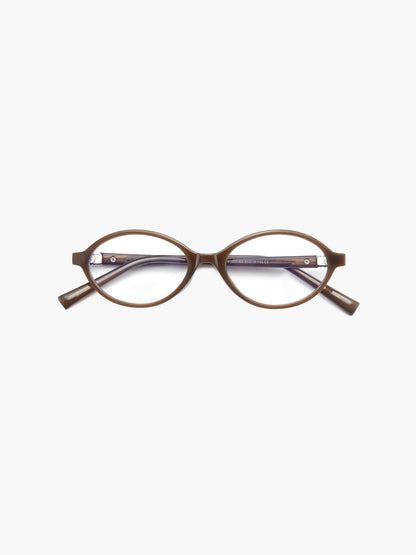 Brown round reading glasses with thin arms and small rhinestone detail