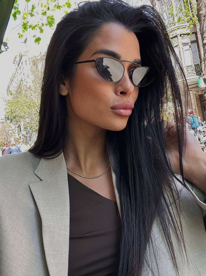Black cat-eye sunglasses with dark mirrored lenses and thin metal arms