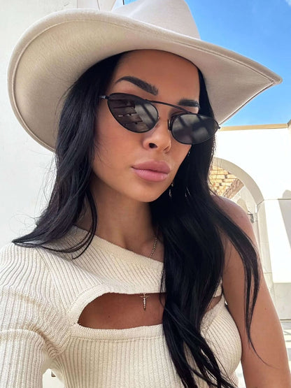 Black sunglasses with dark lenses and thin metal arms