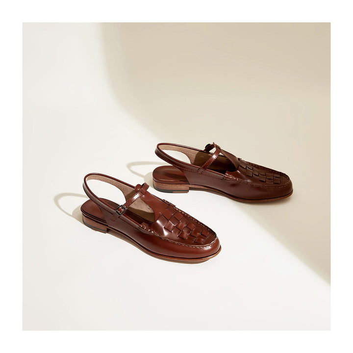 Brown woven charm sandals with T-strap buckle, woven vamp, flat low heel
