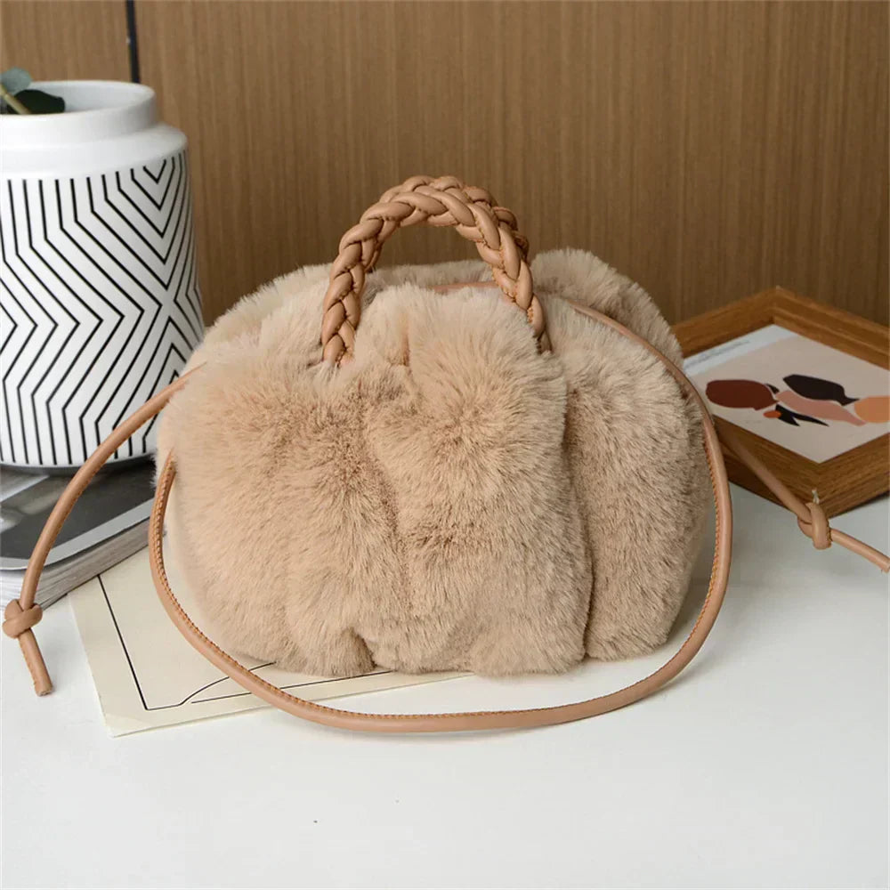 Light khaki plush tote with braided handle and rounded pumpkin-style body