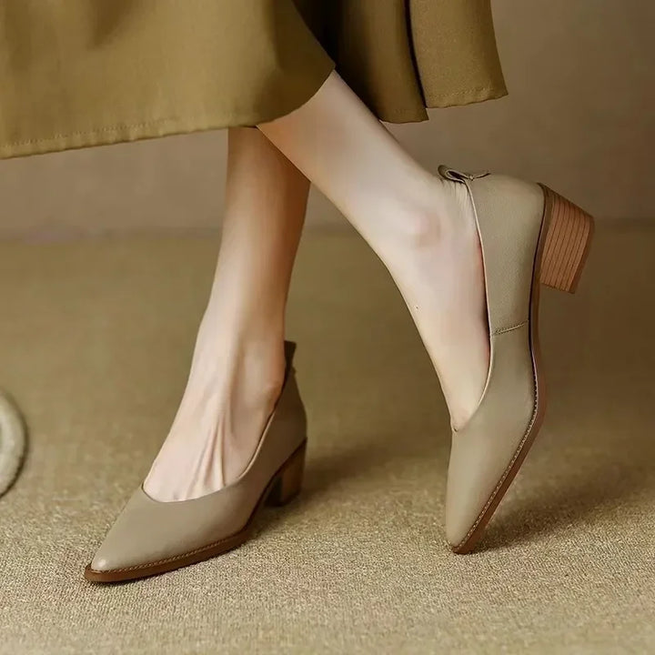 Classic pumps in beige leather-look with almond toe and low wooden block heel