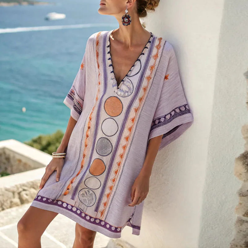 Lavender strand dress with V-neck, short sleeves, purple border trim, circle prints