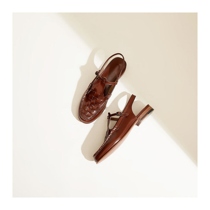 Brown woven charm sandals with T-strap buckle, woven vamp, side view, low heel