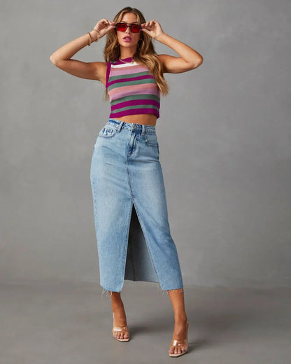 Light blue high-waist denim midi skirt with front slit and frayed hem
