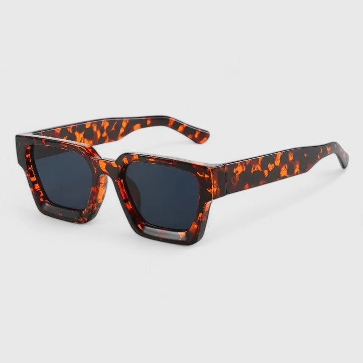 Leopard print square sunglasses with dark lenses and curved temple tips
