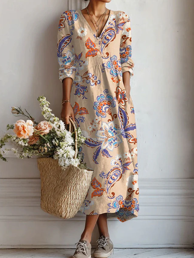 Everyday comfort dress with V-neck, long sleeves, and colorful floral paisley print