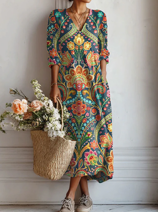 Everyday comfort dress with V-neck, long sleeves, and colorful paisley floral pattern