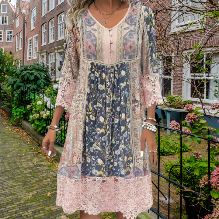 Pink boho midi dress with floral patchwork skirt, lace hem, V-neck button front