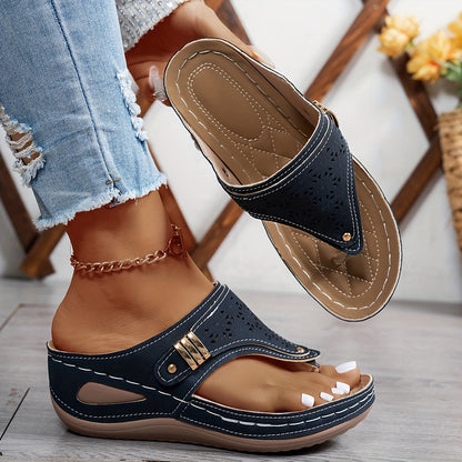 Dark blue orthopedic sandals with perforated toe strap and adjustable buckle closure
