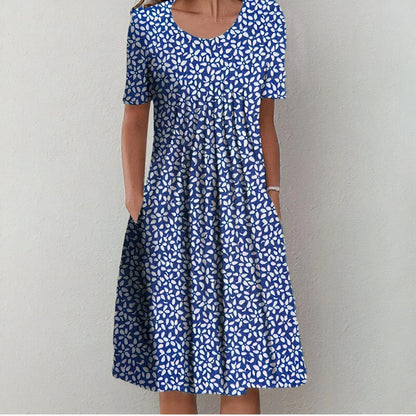 Blue and white leaf-print midi dress with scoop neck, short sleeves, A-line skirt