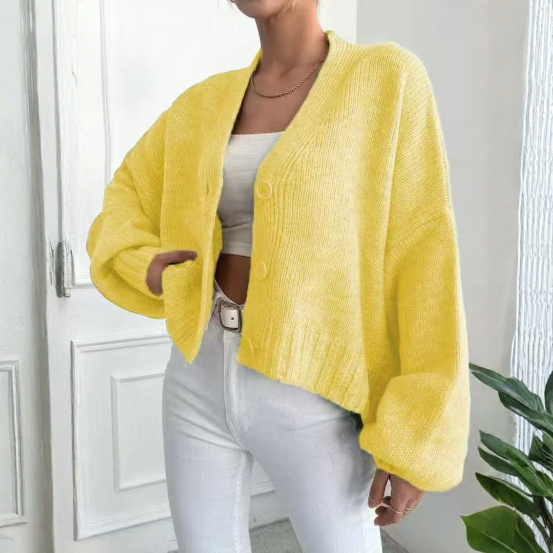Yellow casual crop cardigan with button front and lantern sleeves, ribbed knit