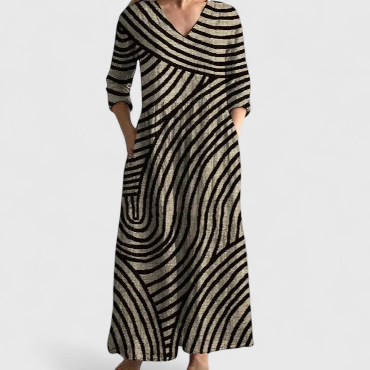 Loose casual printed maxi dress with V-neck, 3/4 sleeves, relaxed silhouette, zebra-like stripes