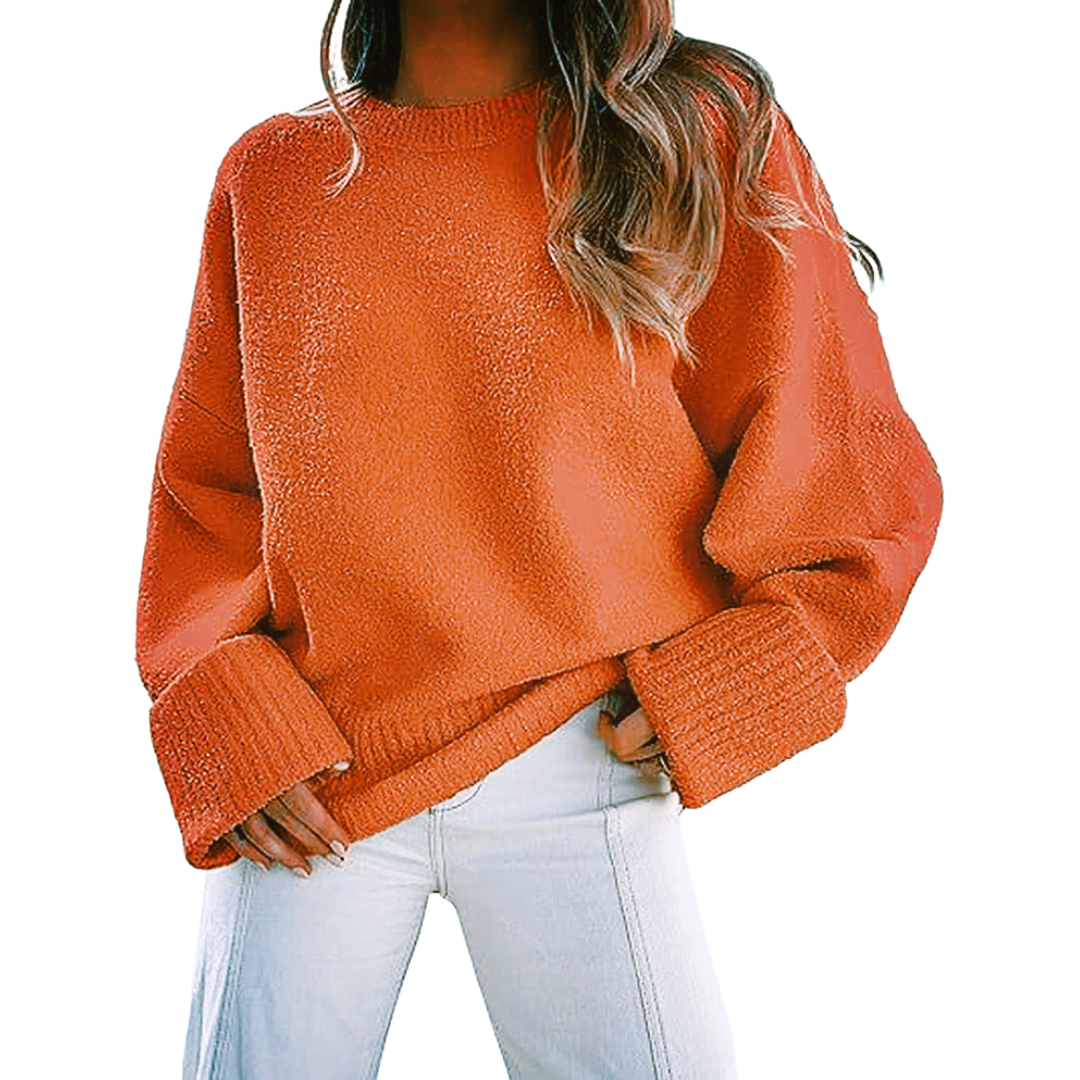 Orange fuzzy knit pullover sweater with crew neck and ribbed cuffs, oversized fit