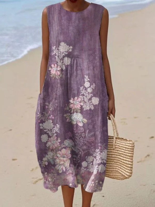 Floral midi dress in purple with sleeveless cut and pink-and-white flower print