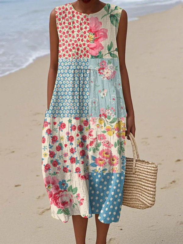 Patchwork midi dress with sleeveless floral and dot panels, round neckline