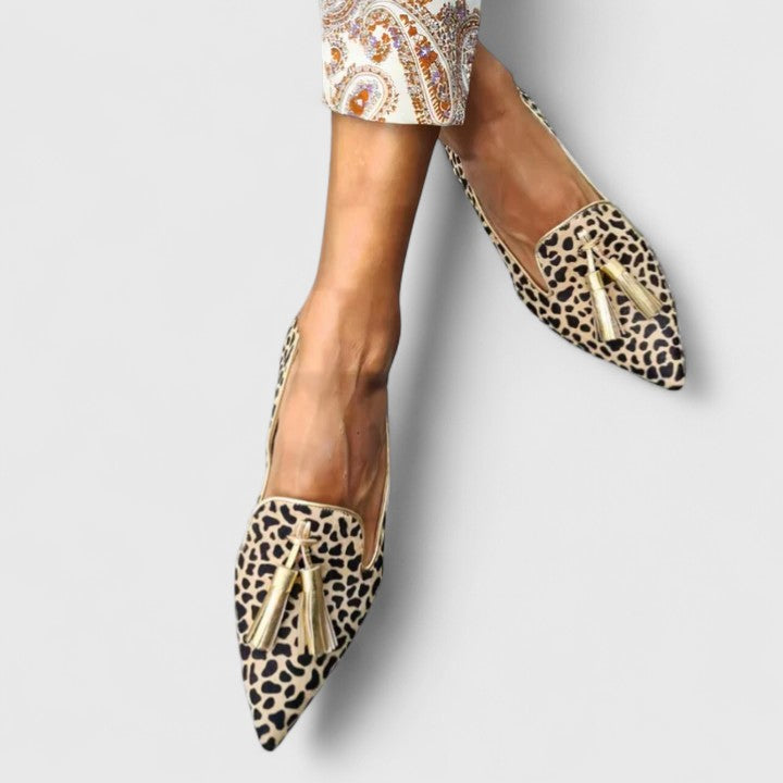 Classic comfort loafers with leopard print and gold tassel detail