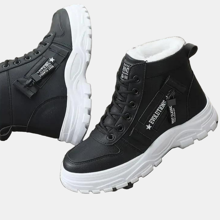 Black lace-up snow boots with faux-fur collar and chunky rubber sole