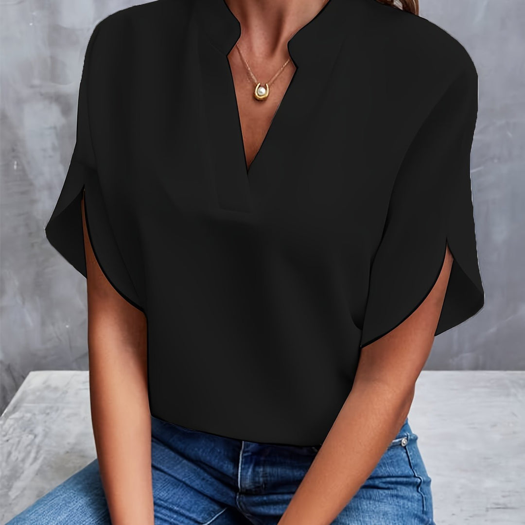 Black women’s luxe flared top with V-neck and draped short sleeves