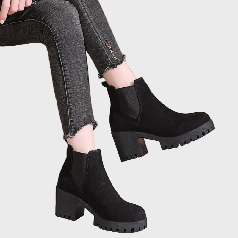 Black block-heel short boots with elastic side panels and rugged tread sole