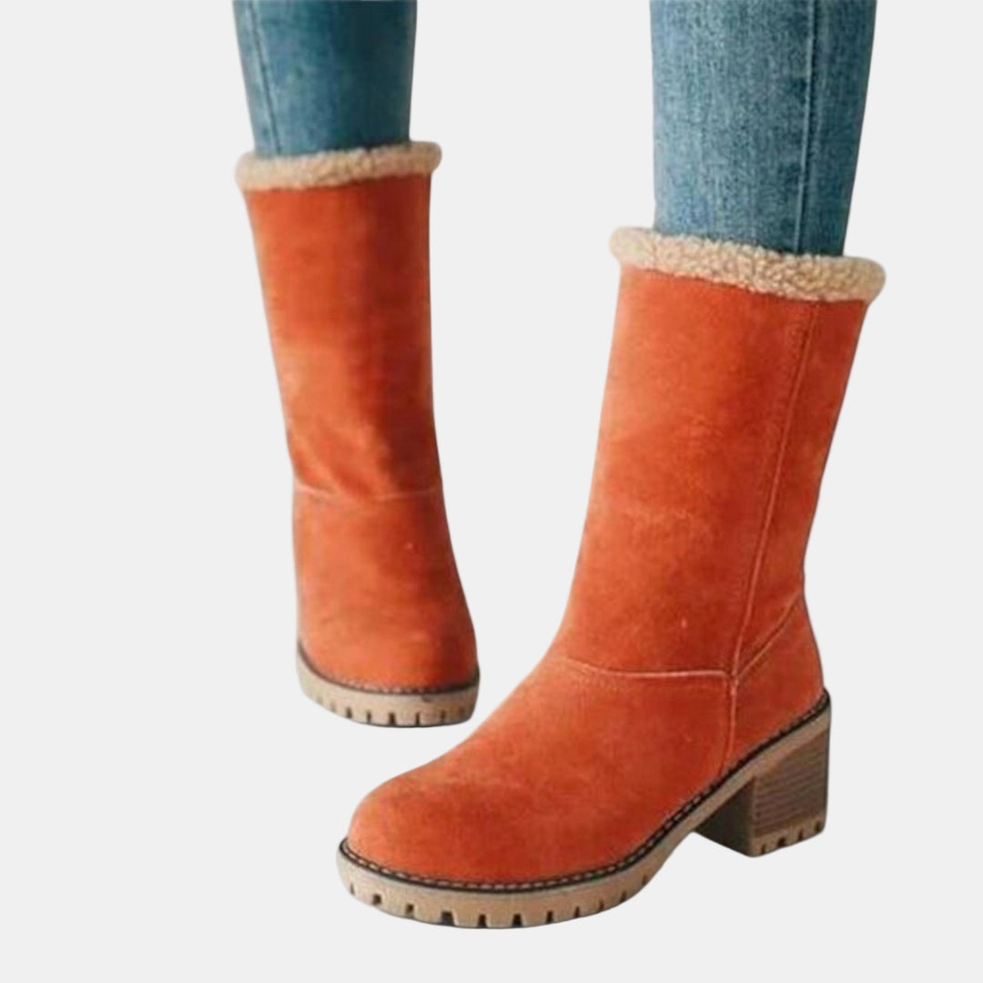 Orange suede casual boots with tan shearling cuff, block heel, and treaded sole