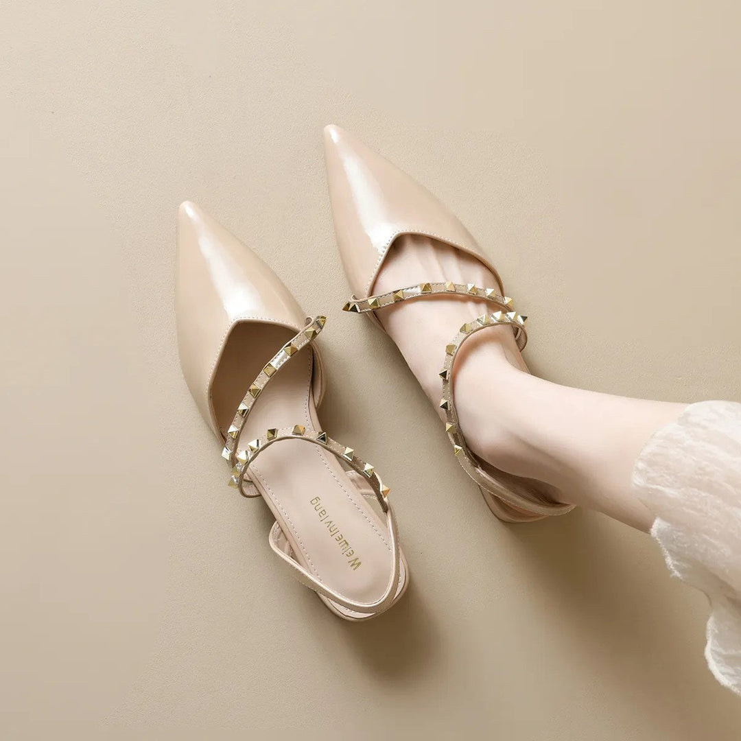 Beige strappy orthopedic heels with pointed toe and gold-tone stud trim