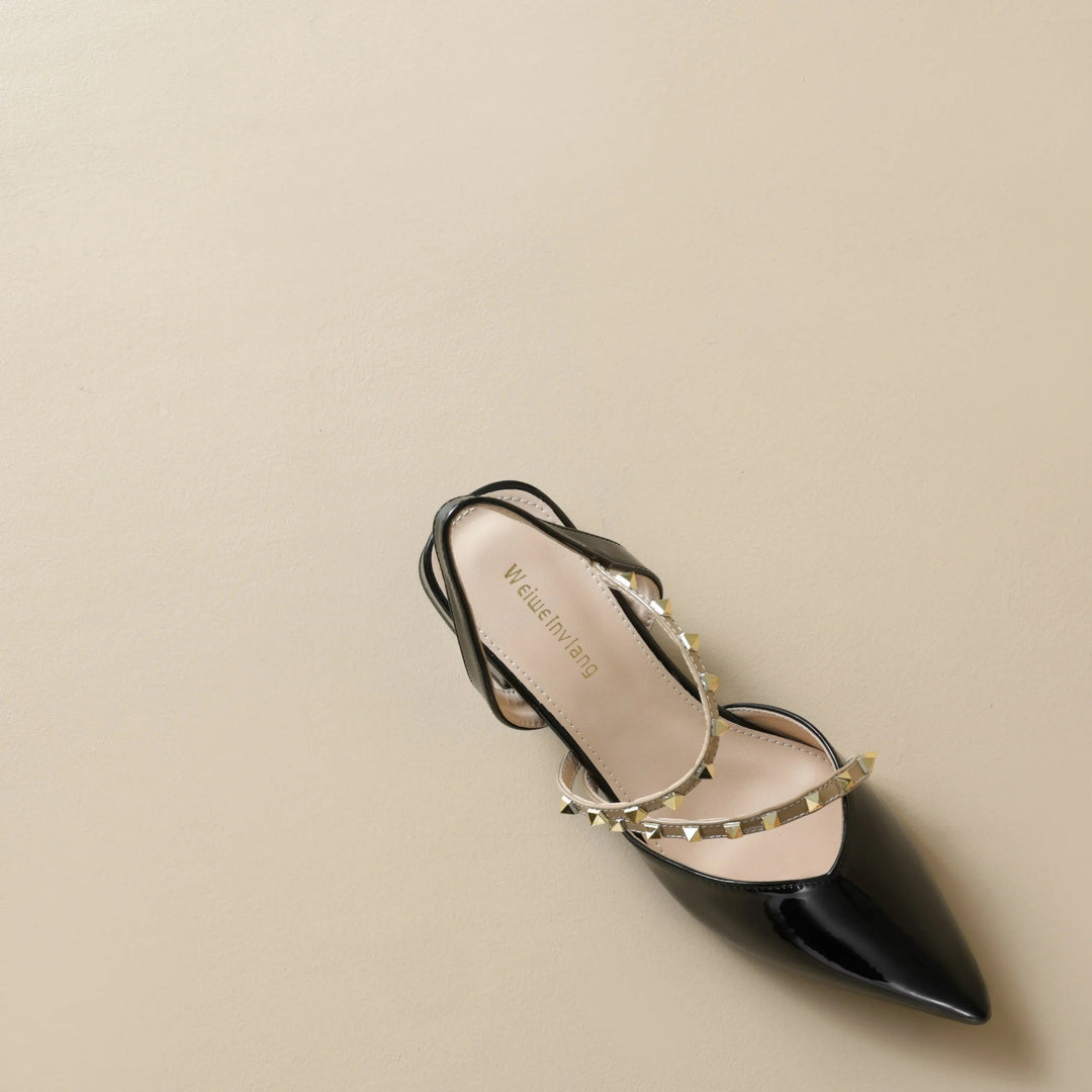 Orthopedic heeled slingback sandal angled side view, black