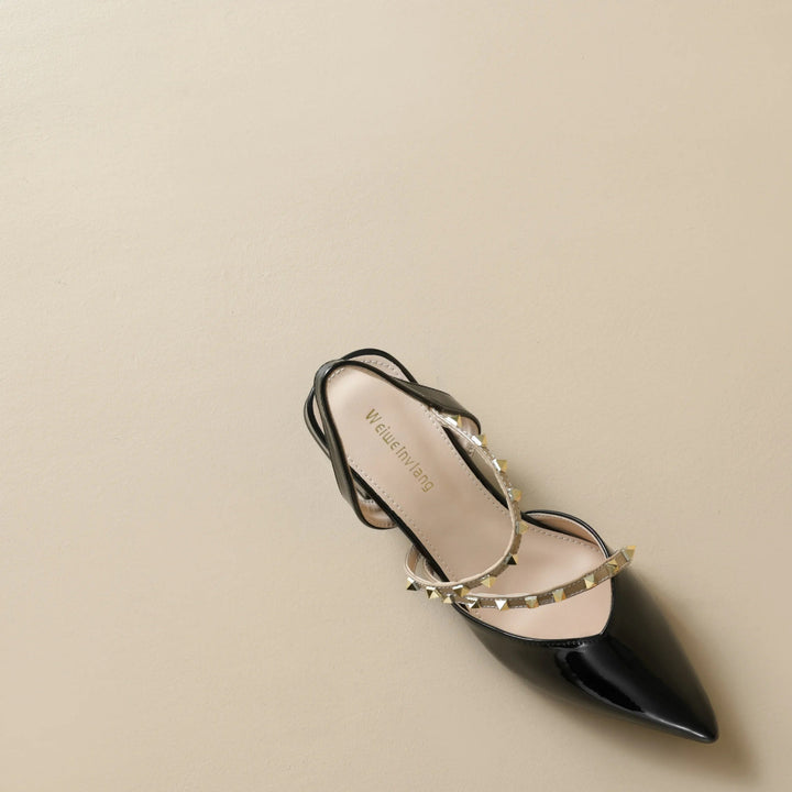 Orthopedic heeled slingback sandal angled side view, black