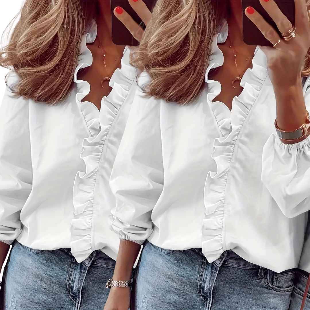 Two white ruffle V-neck blouses with long sleeves; gathered ruffle trim and cuffs