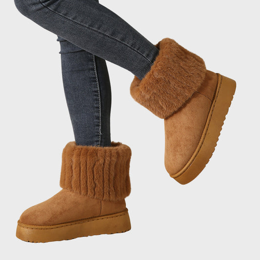 Brown platform ankle boots with faux fur cuff and suede upper