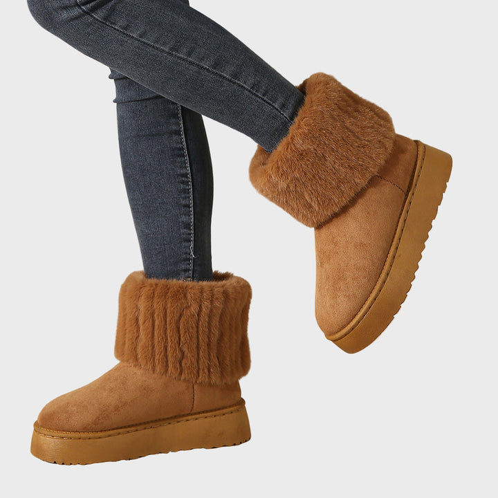 Brown platform ankle boots with faux fur cuff and suede upper