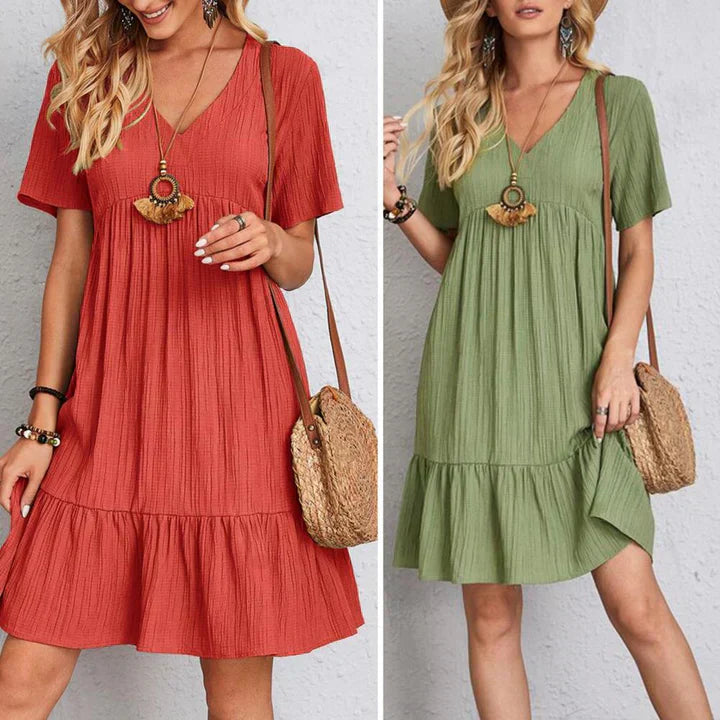 Casual summer dress with V-neck and tiered skirt, shown in red and green