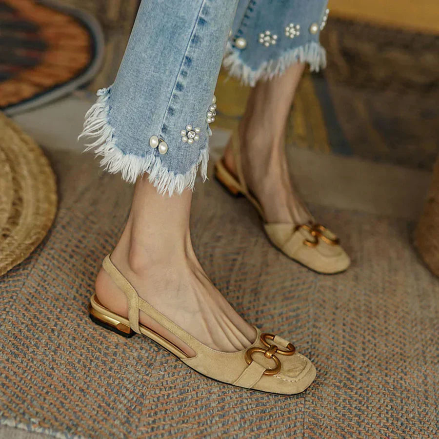 Beige orthopedic sandals, side view, gold-tone link detail on vamp