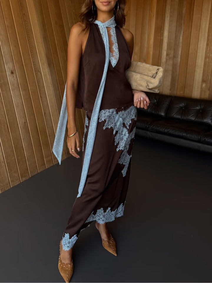 Dark brown lace dress with light blue scalloped hem and lace open-front wrap