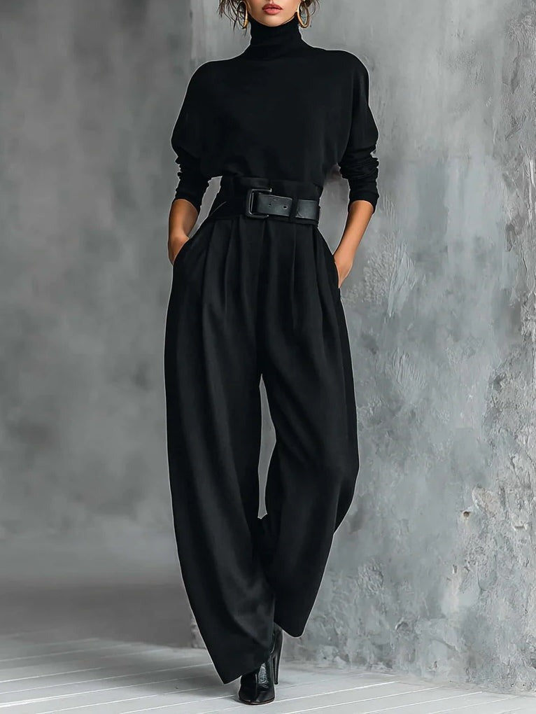 Black fitted turtleneck top and straight-leg trousers set with wide belt