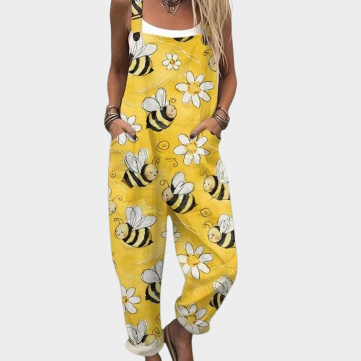 Yellow printed overalls with bee and flower motifs