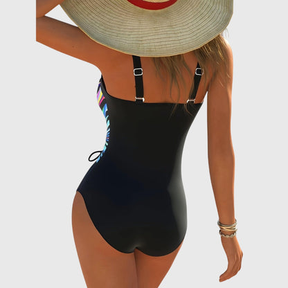 Black backless one-piece swimsuit with adjustable shoulder straps and multicolor trim