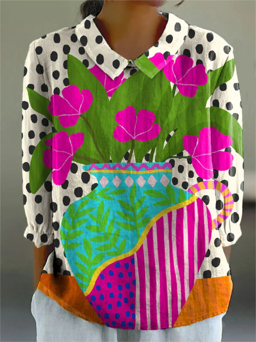 Multicolor patchwork blouse with black polka dots and large pink flowers, button front