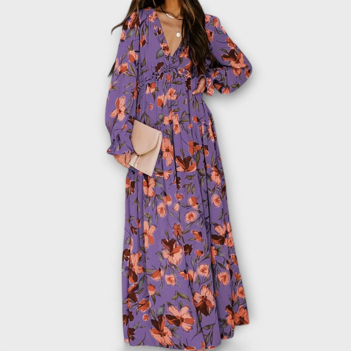 Floral maxi dress in purple with V-neck, long sleeves, gathered waist and tiered skirt